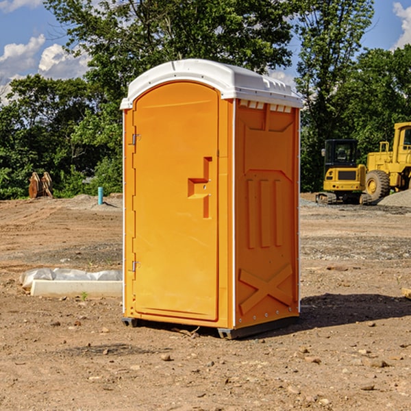 how often are the porta potties cleaned and serviced during a rental period in Alba